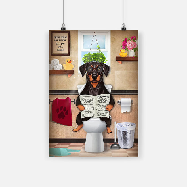 Bathroom wall art doberman puppy sitting on toilet and reading poster 1