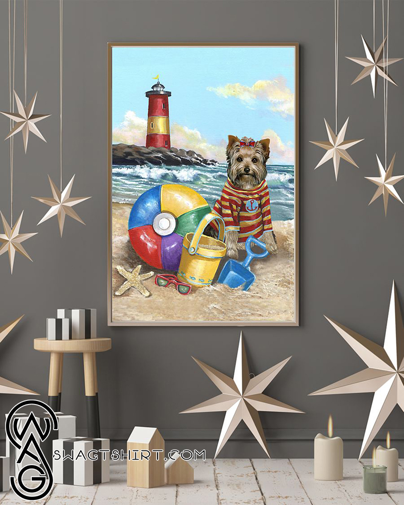 Yorkshire terrier puppy play on the beach poster